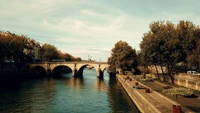 PARIS, FRANCE - OCTOBER 8, 2017. Aerial shot of romantic Seine river embankment on a sunny autumn day stock video PARIS, FRANCE - OCTOBER 8, 2017. Aerial shot of romantic Seine river embankment on a sunny autumn day stock video