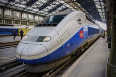 PARIS, OCT, 20, 2009: Saint Lasar railway station. View on silver navy high speed train TGV travel tours. French high speed train stock photo PARIS, OCT, 20, 2009: Saint Lasar railway station. View on silver navy high speed train TGV travel tours. French high speed train stock photo