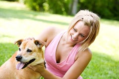 Park: Dog Owner and Pet In Park royalty free stock photography Park: Dog Owner and Pet In Park royalty free stock photography
