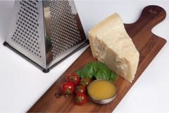 Parmigiano, alimento dell'italiano di natura morta fotografia stock Parmigiano, alimento dell'italiano di natura morta fotografia stock