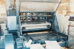 Part of a printing machine for cutting cardboard in printing. Box, production