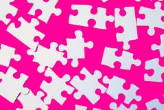 Parties de puzzle sur le rose Photo stock Parties de puzzle sur le rose Photo stock