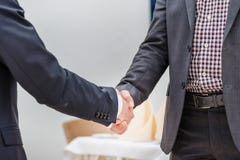 Partners meeting! Two young businessman standing opposite each o stock photo Partners meeting! Two young businessman standing opposite each o stock photo