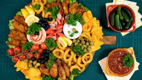 Party Food Charcuterie Meat And Snack Grazing Platter.. Stock Photos