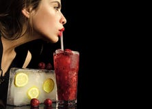 Party and summer vacation. Thirst and refresh. woman drink cocktail with ice cube. stock image Party and summer vacation. Thirst and refresh. woman drink cocktail with ice cube. stock image