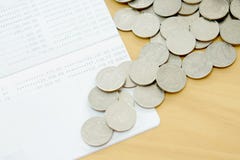 The passbook and coins stock photo The passbook and coins stock photo
