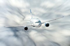 Passenger airplane flies at high speed in the sky. Stock Images Passenger airplane flies at high speed in the sky. Stock Images