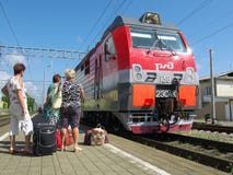 Passengers on the platform of the station Lazarevskoye Sochii expected arrival of the train Royalty Free Stock Image Passengers on the platform of the station Lazarevskoye Sochii expected arrival of the train Royalty Free Stock Image