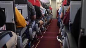 Passengers Sitting Inside Plane