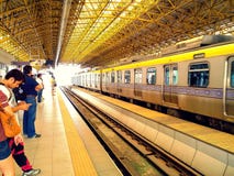 Passengers Waiting At A Train Station Royalty Free Stock Photo Passengers Waiting At A Train Station Royalty Free Stock Photo