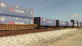 Passing Railroad Containers Stock Photo
