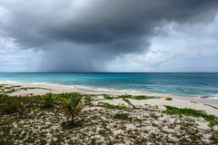 Passing Storm Cloud Over Ocean, Anguilla, British West Indies, BWI, Caribbean Royalty Free Stock Photography Passing Storm Cloud Over Ocean, Anguilla, British West Indies, BWI, Caribbean Royalty Free Stock Photography