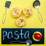 Pasta concept,, Tagliatelle before cooking stock photo Pasta concept,, Tagliatelle before cooking stock photo