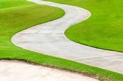 Path curving through green grass in golf course. Stock Photography Path curving through green grass in golf course. Stock Photography