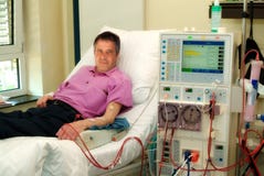 Patient on dialysis machine