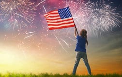 Patriotic holiday. Happy kid. Cute little child girl with American flag. USA celebrate 4th of July Royalty Free Stock Image Patriotic holiday. Happy kid. Cute little child girl with American flag. USA celebrate 4th of July Royalty Free Stock Image