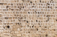 Pattern of cement stone block from castle wall with a lot of hole stock image Pattern of cement stone block from castle wall with a lot of hole stock image