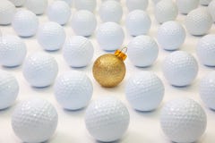 Pattern with white golf balls and gold Christmas decoration