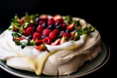 Pavlova Cake With Tonka Cream And Berries Stock Photos