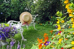 Peacuful Summer Garden With A Hat Stock Photography
