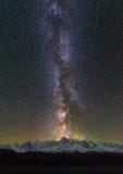 Peaks Of The Mountains. Stars In The Night Sky. Milky Way Galaxy Over The North-Chuya Ridge.