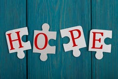 Pedazos del rompecabezas con el texto imagenes de archivo Pedazos del rompecabezas con el texto imagenes de archivo