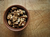 Peeled walnuts in a plate of clay royalty free stock images Peeled walnuts in a plate of clay royalty free stock images