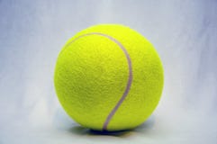 Pelota de tenis grande fotografía de archivo Pelota de tenis grande fotografía de archivo