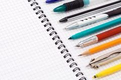 Pen And Pencil On Pad Royalty Free Stock Photo