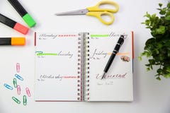 Pen on a self made planner. Modern office desk. Working, writing royalty free stock photography Pen on a self made planner. Modern office desk. Working, writing royalty free stock photography