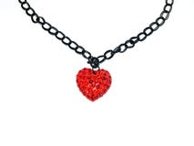 Pendente e collana a forma di cuore fotografia stock Pendente e collana a forma di cuore fotografia stock