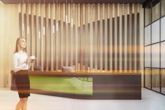 Pensive woman near office reception royalty free stock photo Pensive woman near office reception royalty free stock photo