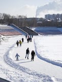 People of all ages skating at the city stadium Stock Image People of all ages skating at the city stadium Stock Image