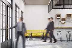 People in cafe with a yellow sofa royalty free stock images People in cafe with a yellow sofa royalty free stock images