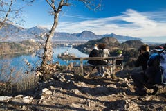 People enjoying aerial view from top hill on scenic lake bled royalty free stock photo People enjoying aerial view from top hill on scenic lake bled royalty free stock photo