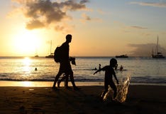 People enjoying sunset & playing on COVID free beach.