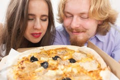 Couple eating pizza, having fun together royalty free stock photo Couple eating pizza, having fun together royalty free stock photo