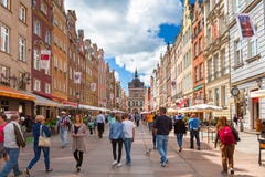 People on the Long Lane of the old town in Gdansk, Poland. stock photo People on the Long Lane of the old town in Gdansk, Poland. stock photo