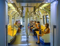 People sitting on BTS train stock photography People sitting on BTS train stock photography