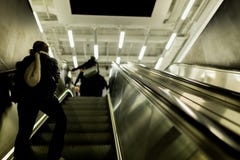 People walking up on escalator Royalty Free Stock Image People walking up on escalator Royalty Free Stock Image