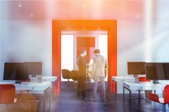 People in white and red open space office royalty free stock photography People in white and red open space office royalty free stock photography