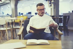 People at work creating article about literature stock photo People at work creating article about literature stock photo