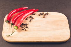 Peperoncini e spezie roventi/peperoncini e spezia roventi immagine stock Peperoncini e spezie roventi/peperoncini e spezia roventi immagine stock