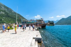 Perast, Montenegro - June 10. 2019: Tourists On Artificial Island Of Gospa Od Skrpjela Stock Photo Perast, Montenegro - June 10. 2019: Tourists On Artificial Island Of Gospa Od Skrpjela Stock Photo