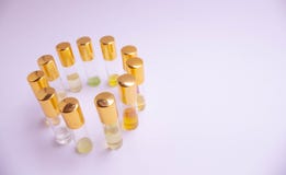 Perfume sampleson white background. Beautiful composition with perfume samples on light backgroundPerfume roller tester stock image Perfume sampleson white background. Beautiful composition with perfume samples on light backgroundPerfume roller tester stock image