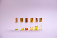 Perfume sampleson white background. Beautiful composition with perfume samples on light backgroundPerfume roller tester stock photos Perfume sampleson white background. Beautiful composition with perfume samples on light backgroundPerfume roller tester stock photos