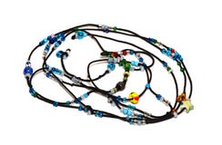 Perles bleues sur la corde noire images stock Perles bleues sur la corde noire images stock