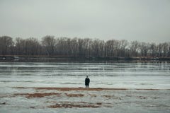 Person Standing Near Body of Water Stock Photography Person Standing Near Body of Water Stock Photography
