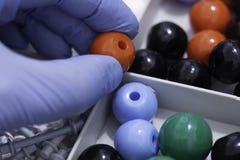 Person Taking An Oxygen Molecule From A Molecular Model Kit Royalty Free Stock Images Person Taking An Oxygen Molecule From A Molecular Model Kit Royalty Free Stock Images