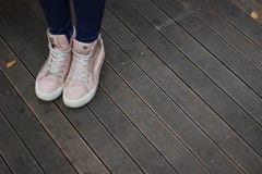 Person Wearing Pink and White High Top Sneakers Royalty Free Stock Photography Person Wearing Pink and White High Top Sneakers Royalty Free Stock Photography